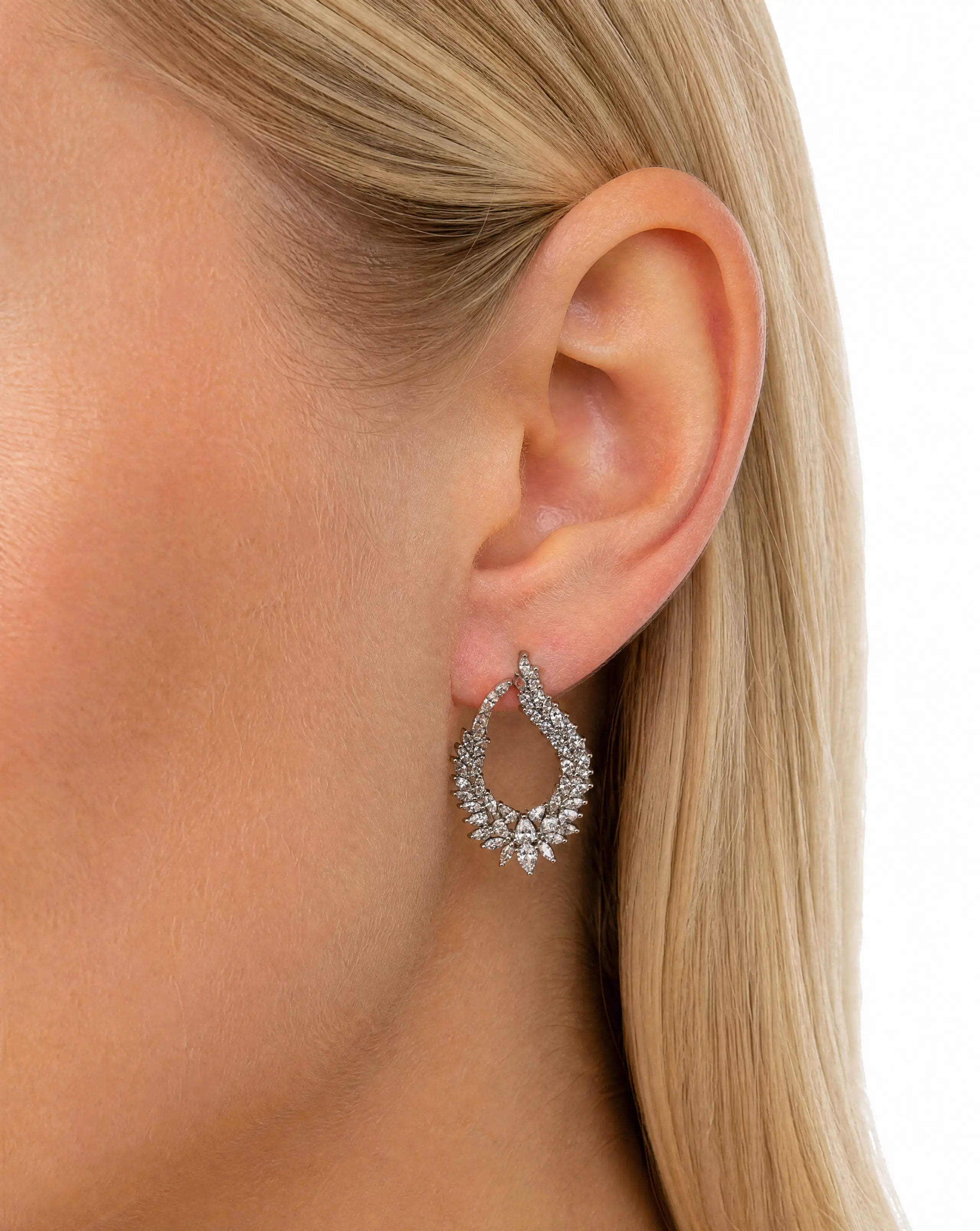 silver earrings crafted in 925 sterling silver with radiant cubic zirconia 