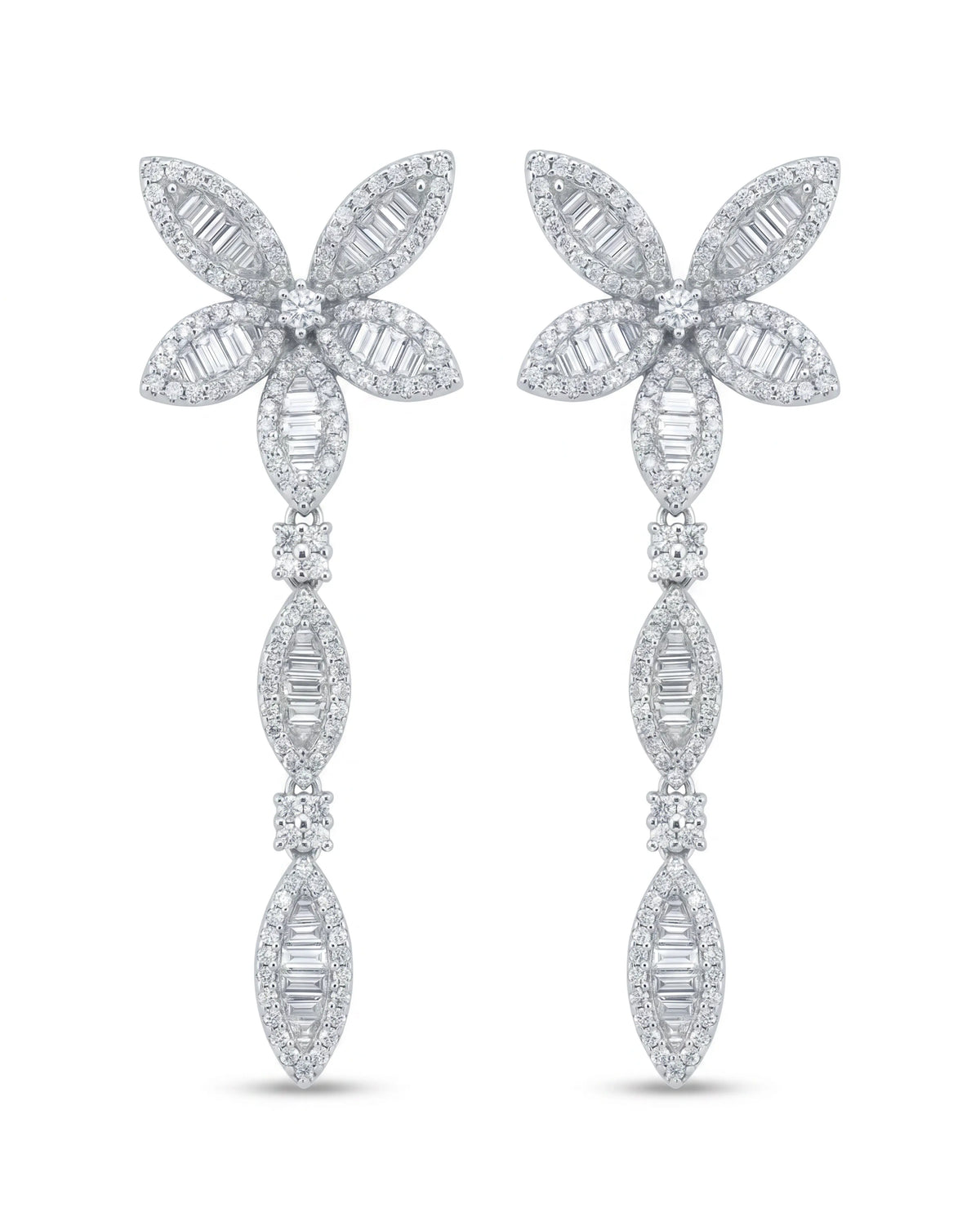 Pair of diamond earrings on a white background