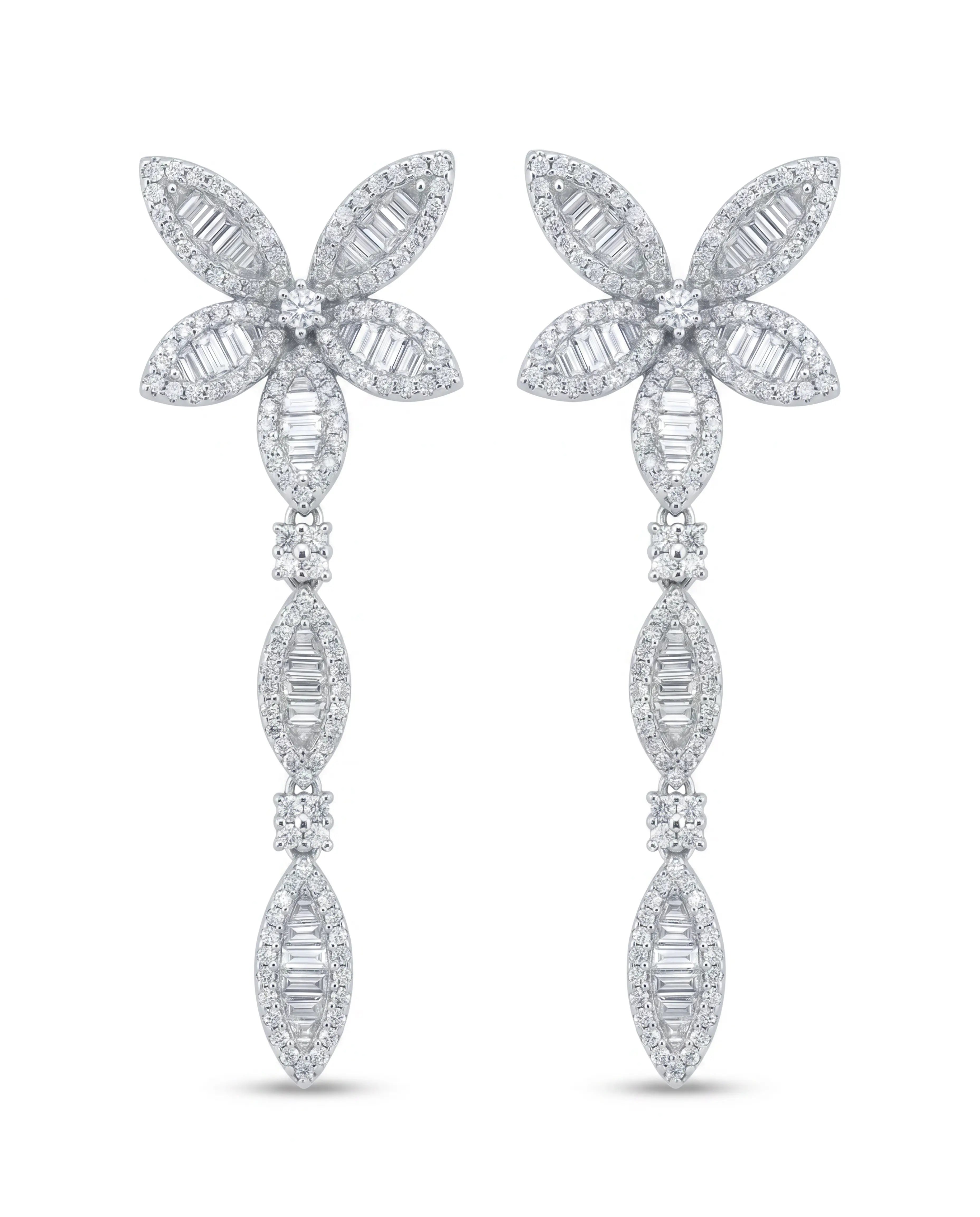 Pair of diamond earrings on a white background