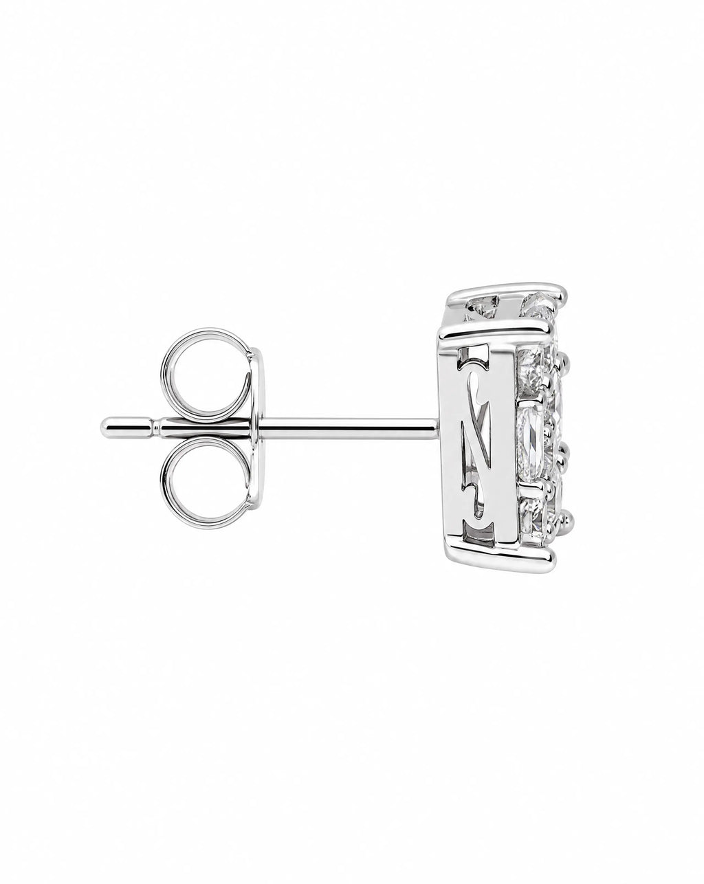 Silver earring with a clear gemstone on a white background