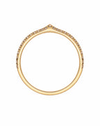 Gold ring with small diamonds on a white background