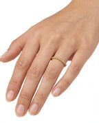 Hand wearing a 14K gold ring