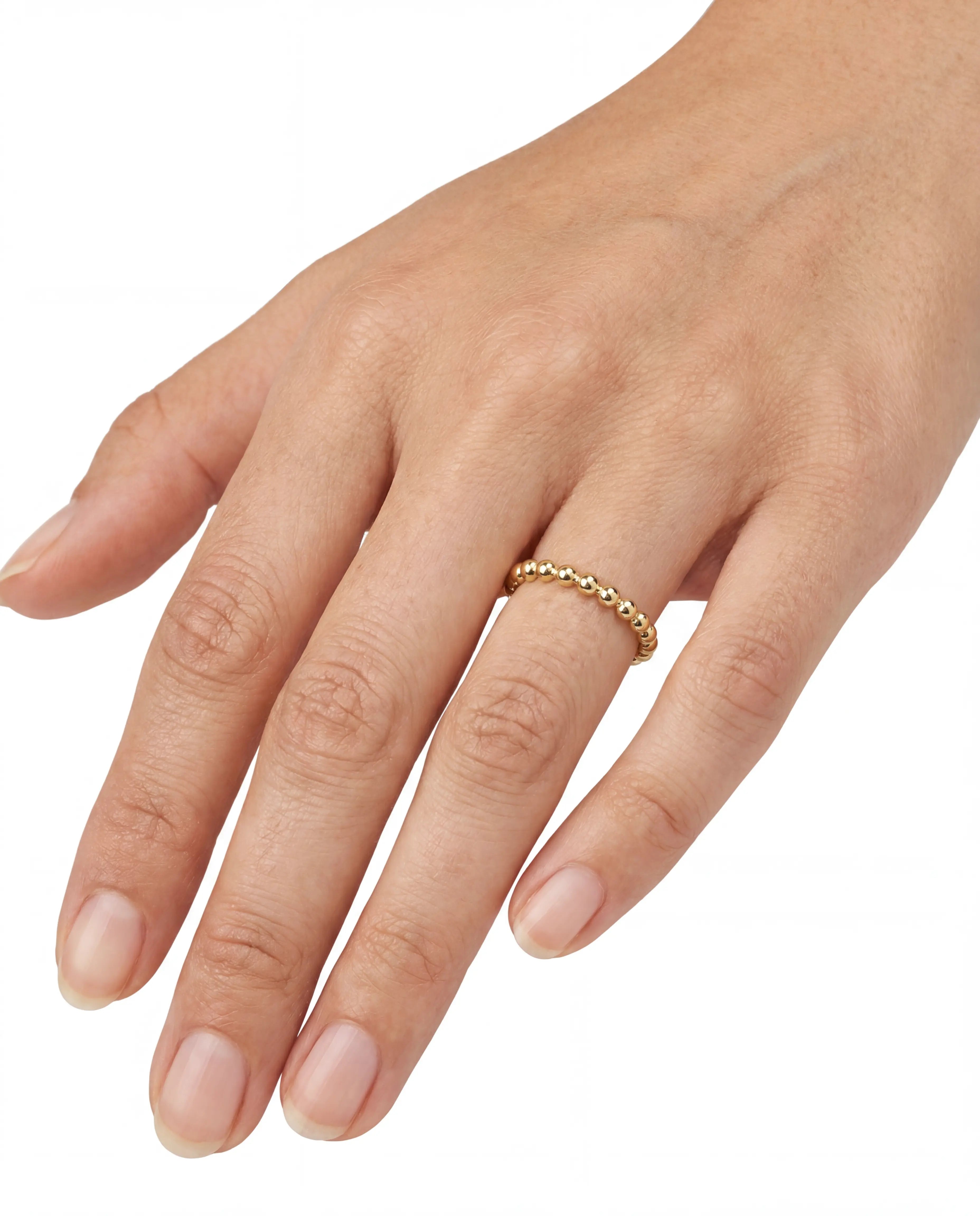 Hand wearing a 14K gold ring