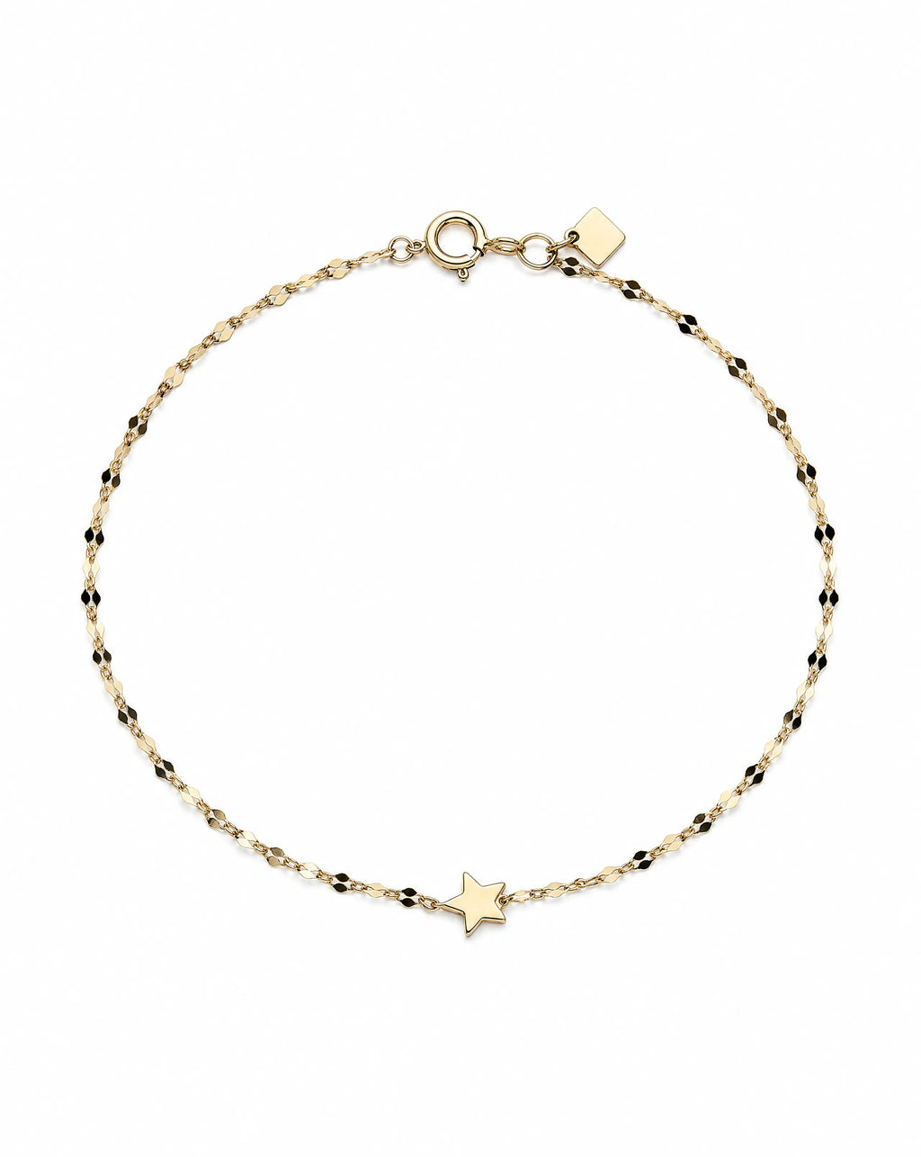 Gold bracelet with star charm on a white background