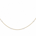 Gold necklace with small pearls on a white background